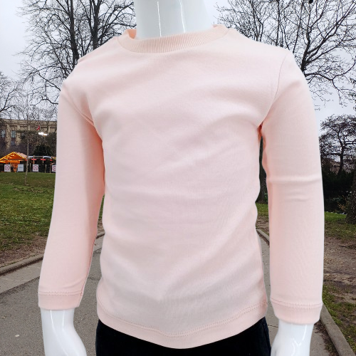 T-shirt rose à manches longues pour enfant, en 95% coton et 5% lycra, offrant confort et flexibilité. Disponible en tailles 1 à 4 ans, parfait pour un look décontracté ou en superposition.