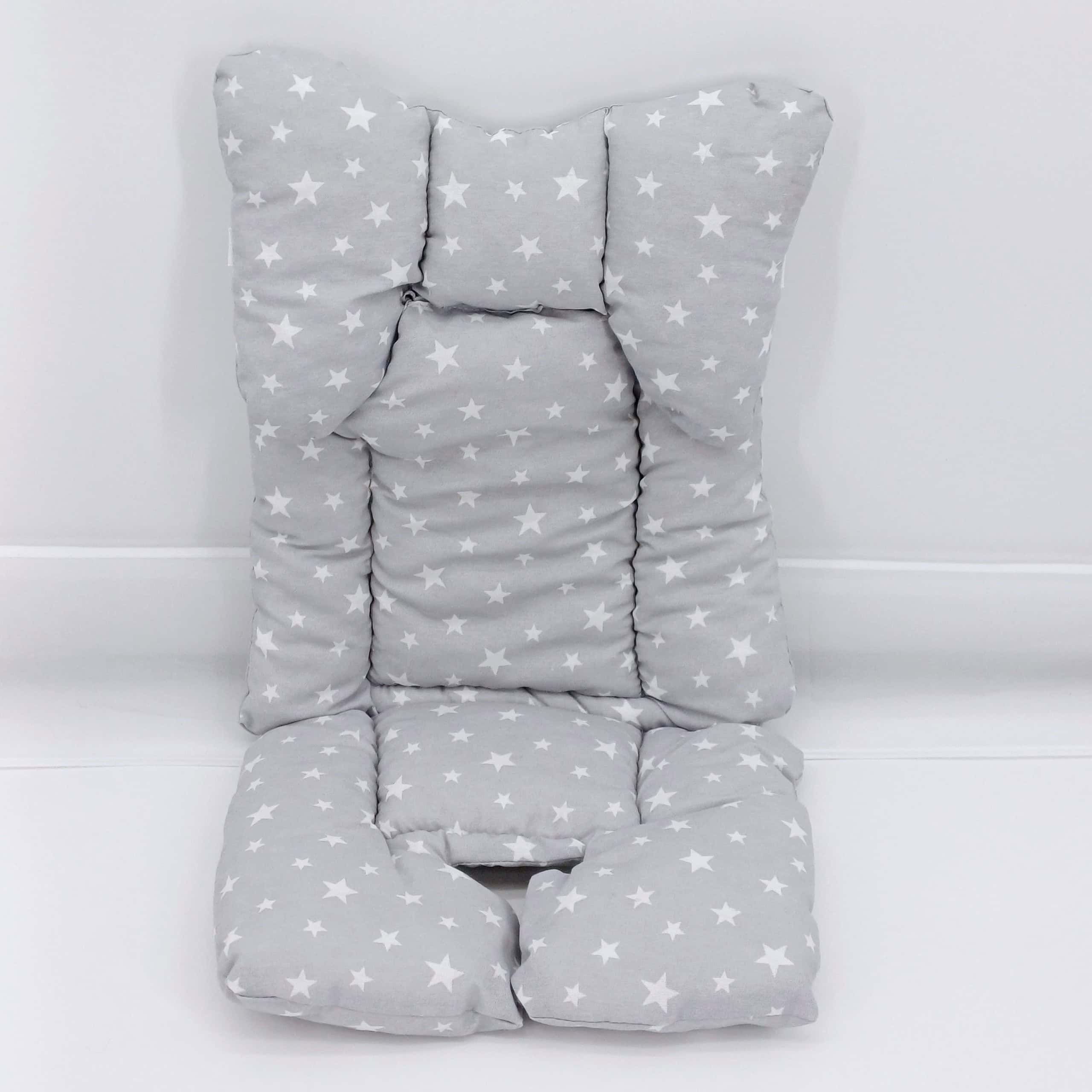 Coussin de confort pour poussette et siège auto avec motif étoiles, anti-transpiration et facile à installer, pour un trajet agréable et sécurisé pour bébé.