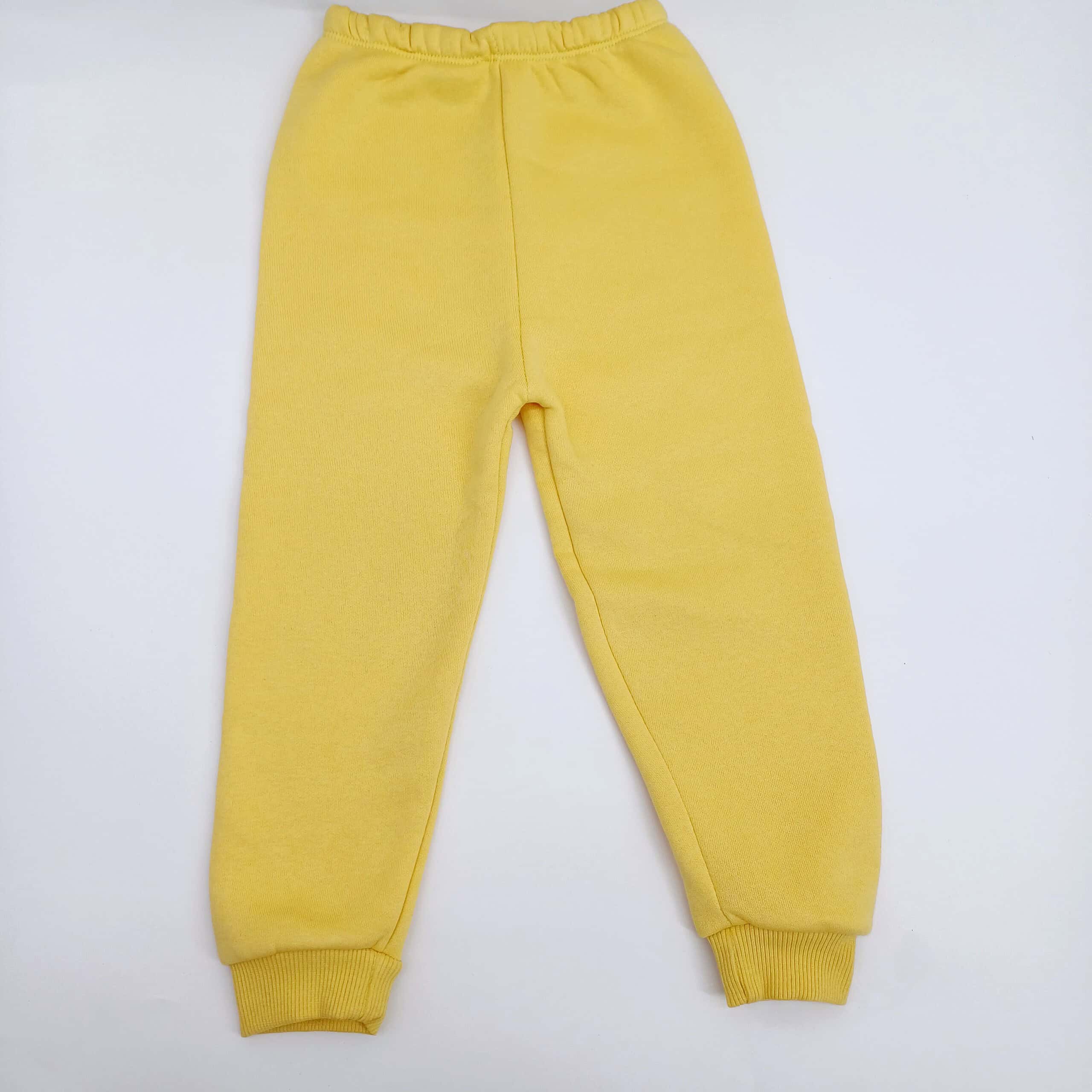 Ensemble fille en coton 100% avec intérieur molletonné "Spread Love", idéal pour l'hiver. Sweat et pantalon assortis pour filles de 5 à 8 ans. Parfait pour les mamans en Belgique recherchant chaleur et confort.