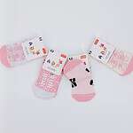 Lot de 4 paires de chaussettes bébé fille avec semelle antidérapante, disponibles en tailles 0-4 ans. Confortables, douces et sécurisées pour les premiers pas de votre enfant