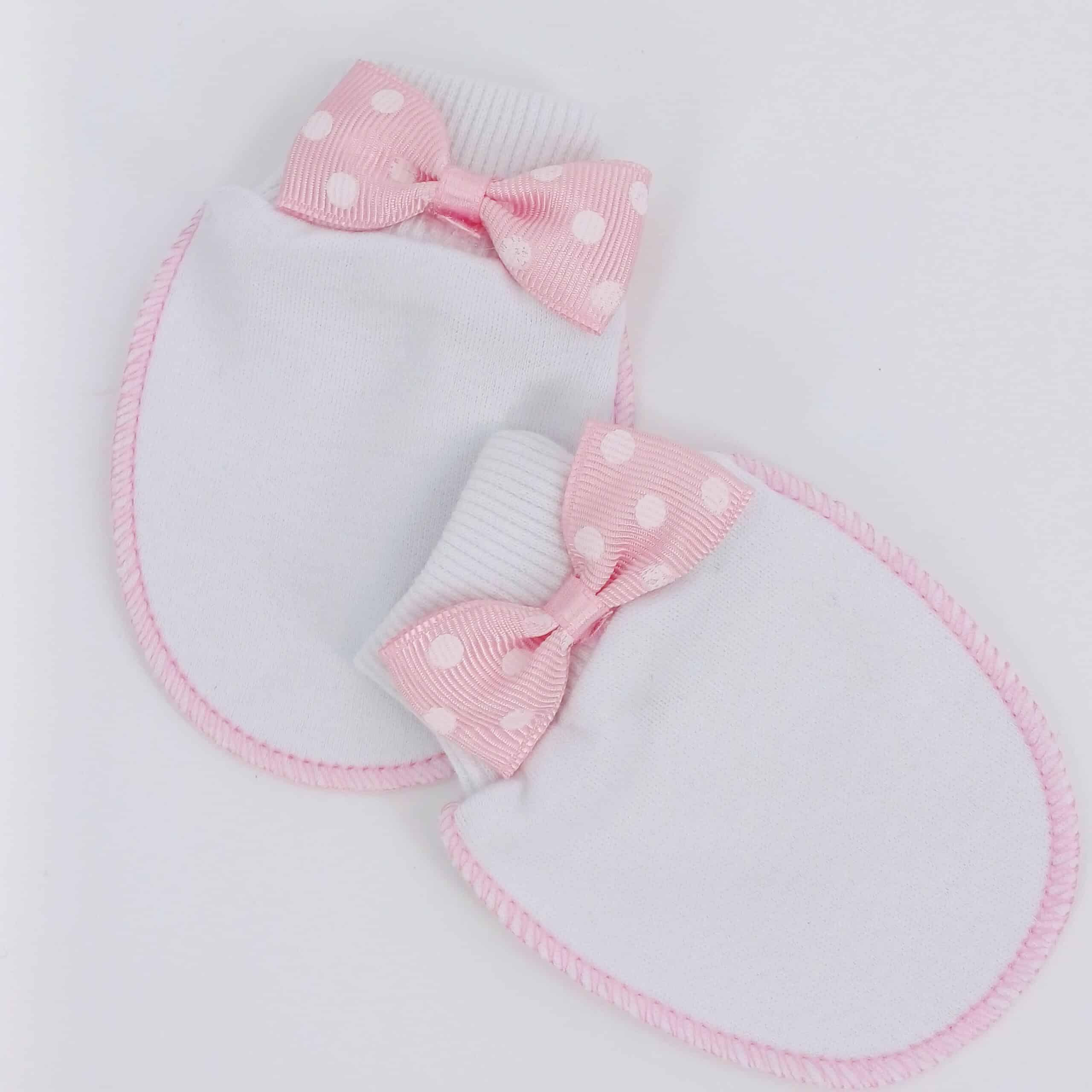 Moufles en coton doux pour bébé avec un nœud papillon à pois. Parfaites pour protéger la peau délicate des nouveau-nés