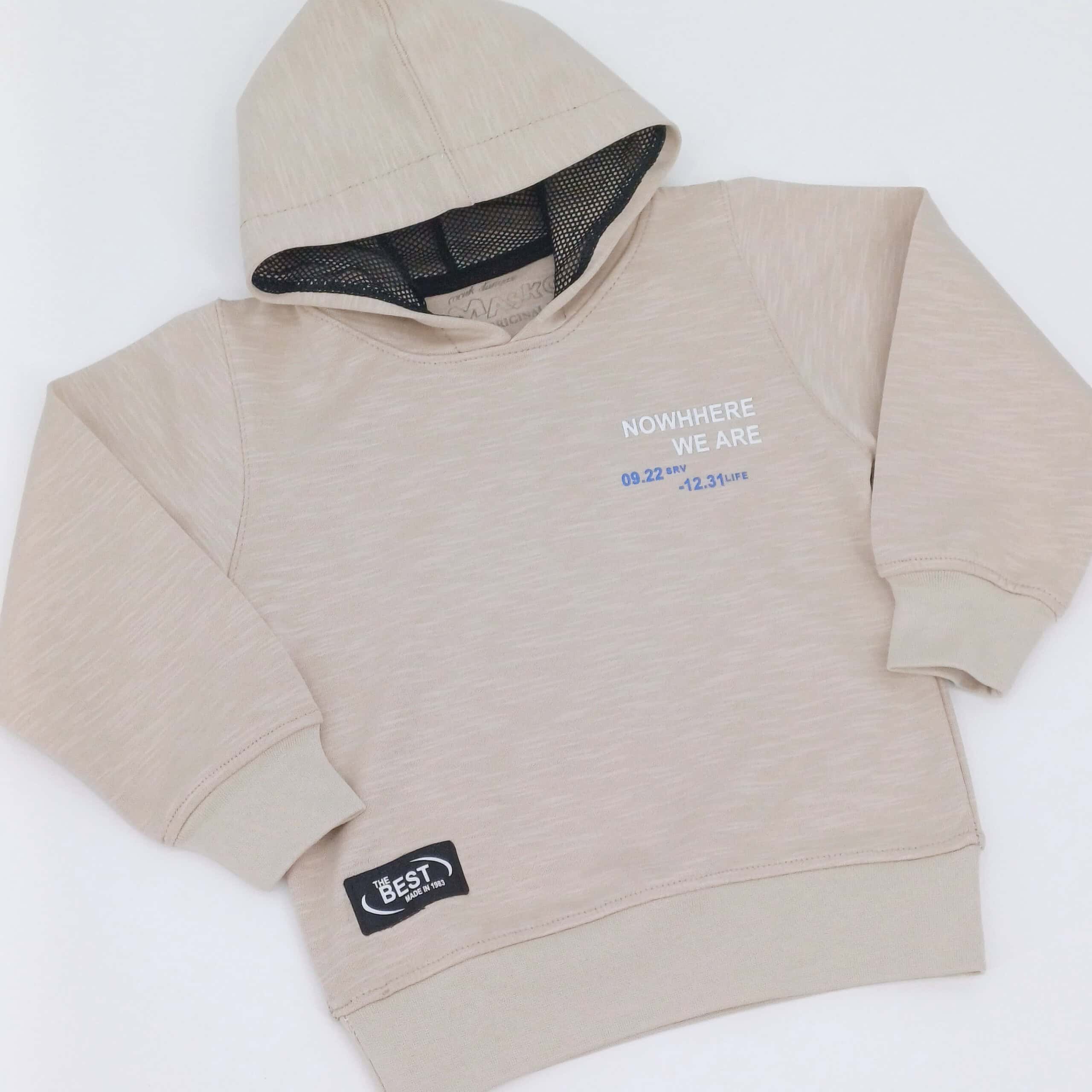 Sweat à capuche beige pour enfants avec impressions modernes bleues et blanches, disponible en tailles 1, 2, 3 et 4 ans. Idéal pour les journées fraîches et les promenades.