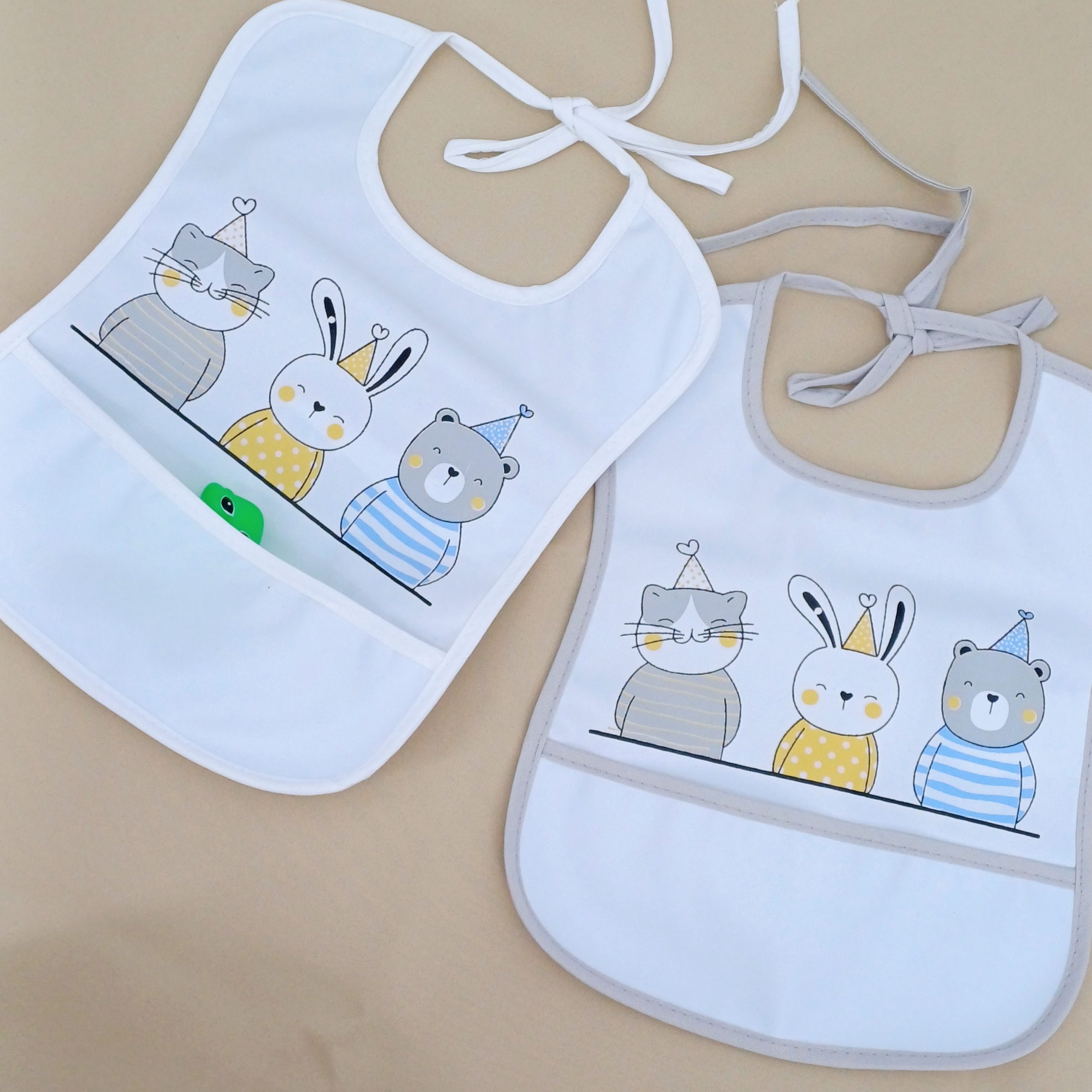 Bavoir imperméable pour bébé (6-12 mois) avec poche récupératrice