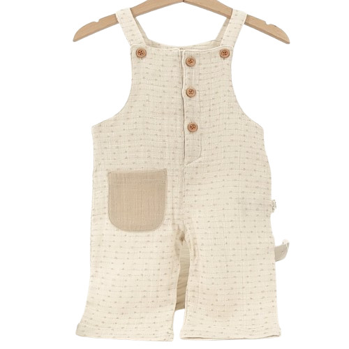 salopette bébé en coton bio écrue avec poche contrastée