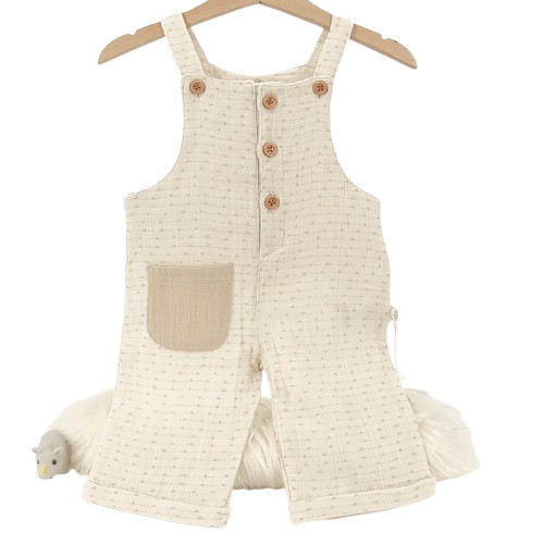 salopette bébé en coton bio écrue avec poche contrastée